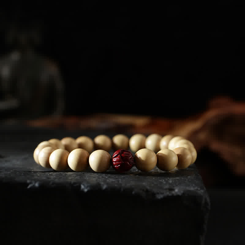 Cinnabar Bracelet with Peach Wood and Lotus Symbols