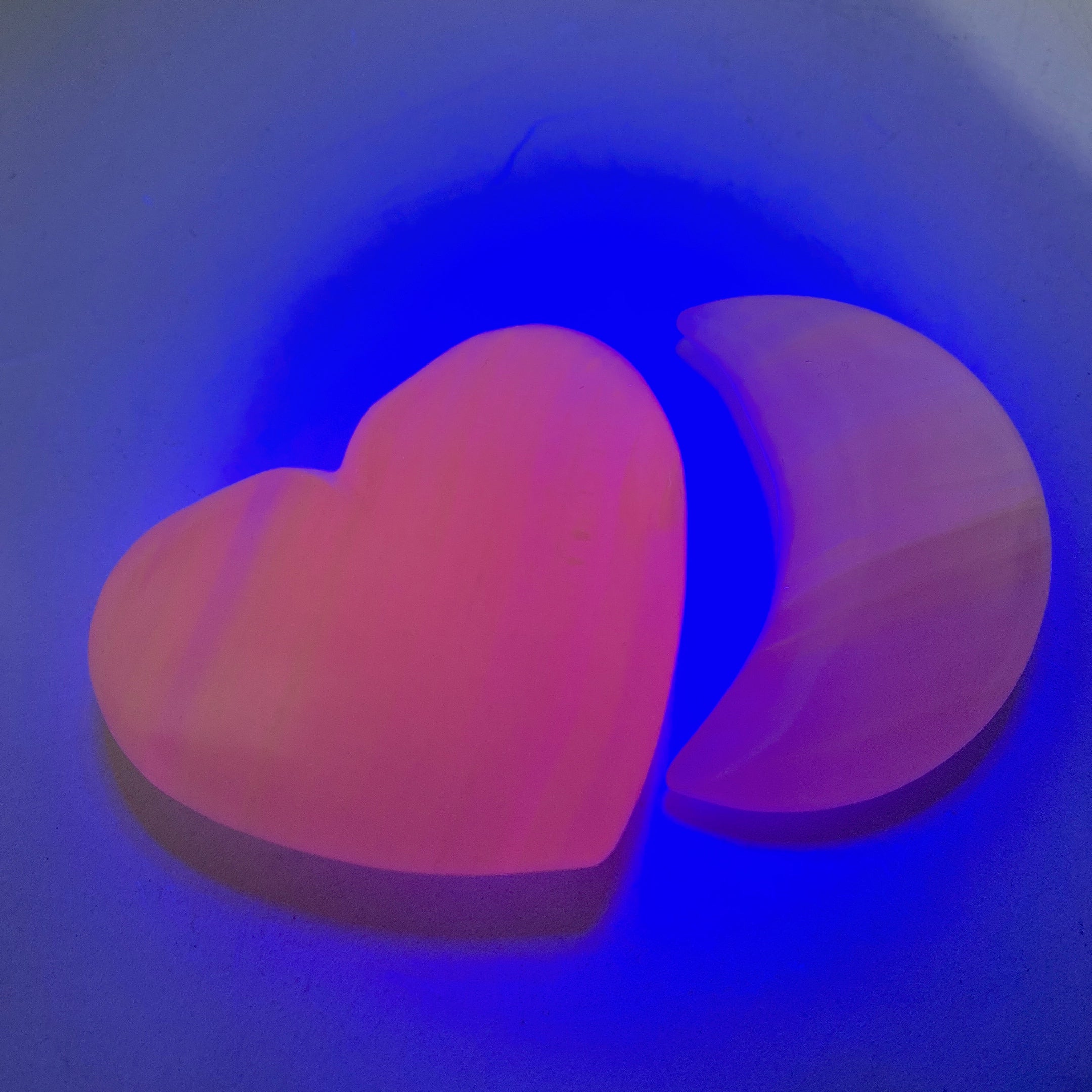 2.2-2.4in UV Reactive Pink Calcite Healing Palm Stone Trio