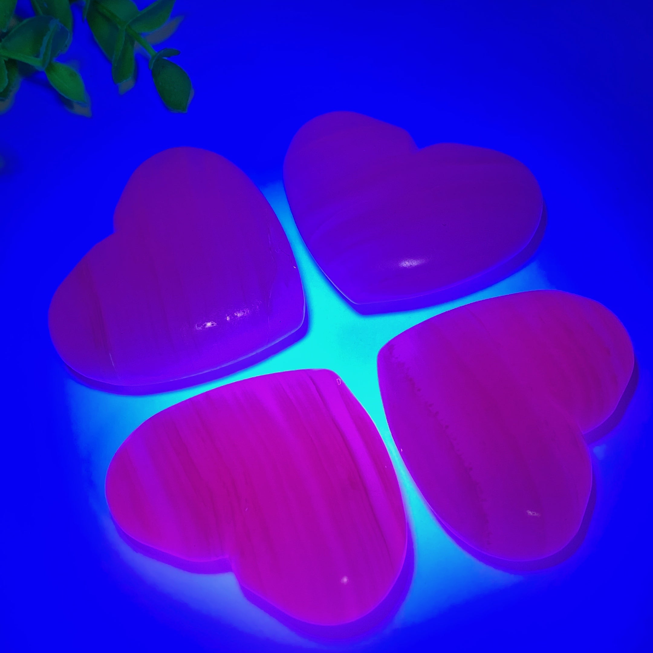 2.2-2.4in UV Reactive Pink Calcite Healing Palm Stone Trio
