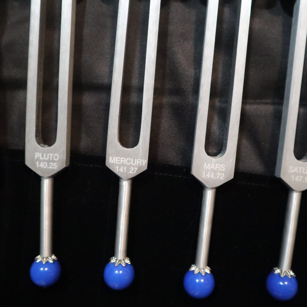 Tuning forks with blue spherical tips in 20pc Solfeggio & Planetary Tuning Fork Set