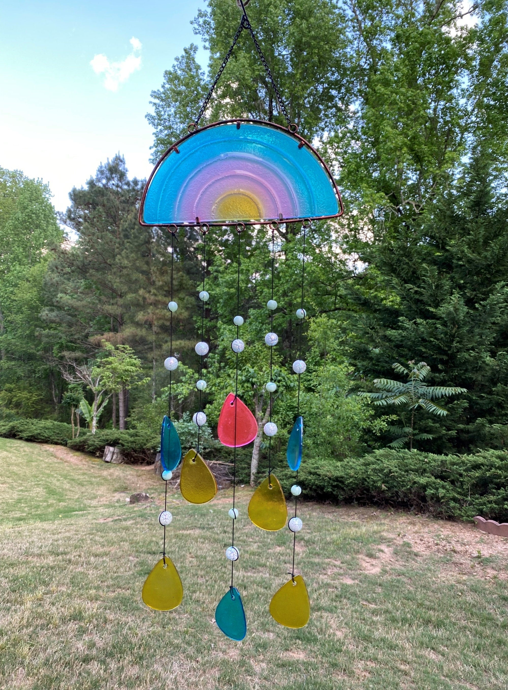 Rainbow glass wind chime with semicircular suncatcher and colorful hanging beads