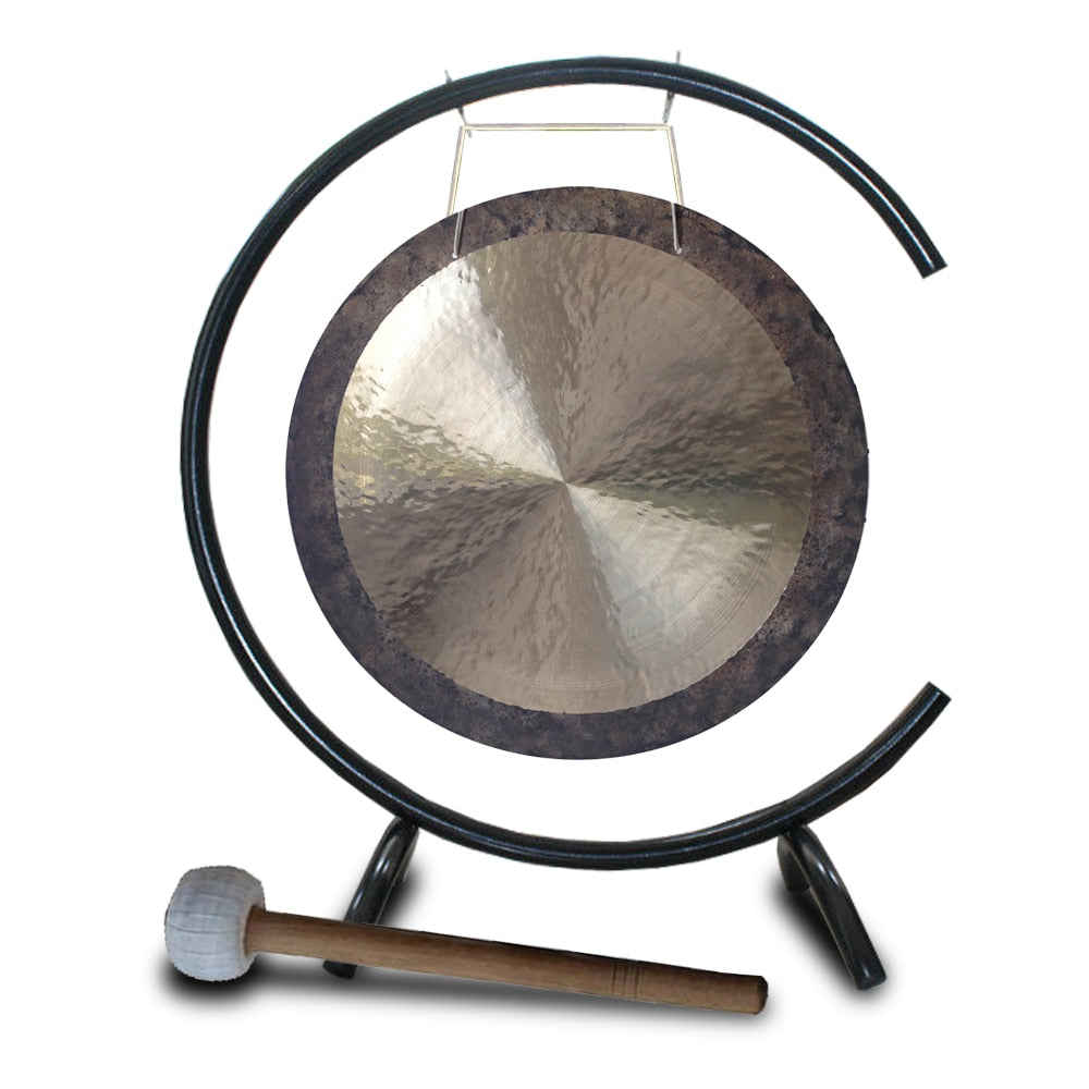 Circular gong with wooden mallet on C-shaped stand for sound healing therapy