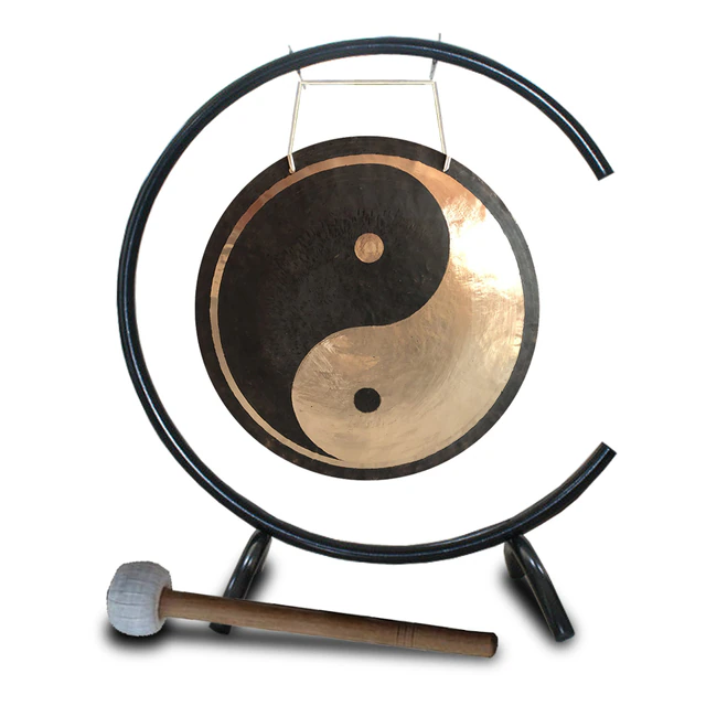 Yin-yang gong on black stand with wooden mallet for sound healing and relaxation