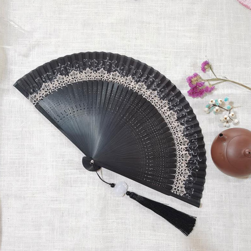 22cm Bamboo Folding Fan with Hollow Engraved Design | Tranquil Comfort