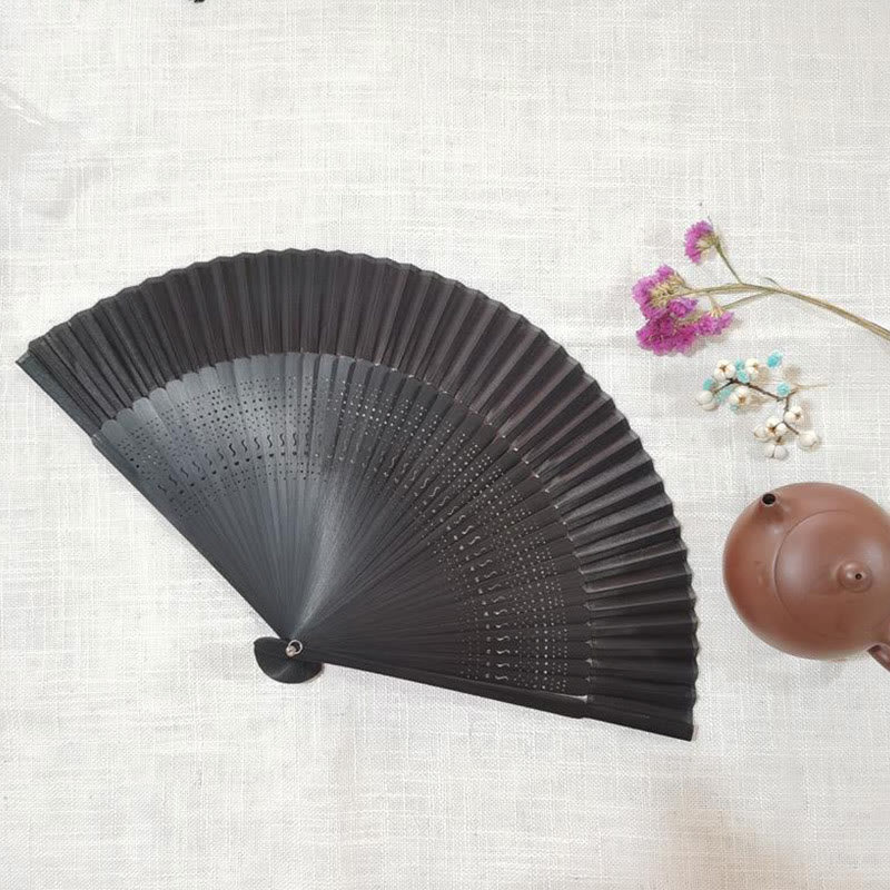 22cm Bamboo Folding Fan with Hollow Engraved Design | Tranquil Comfort