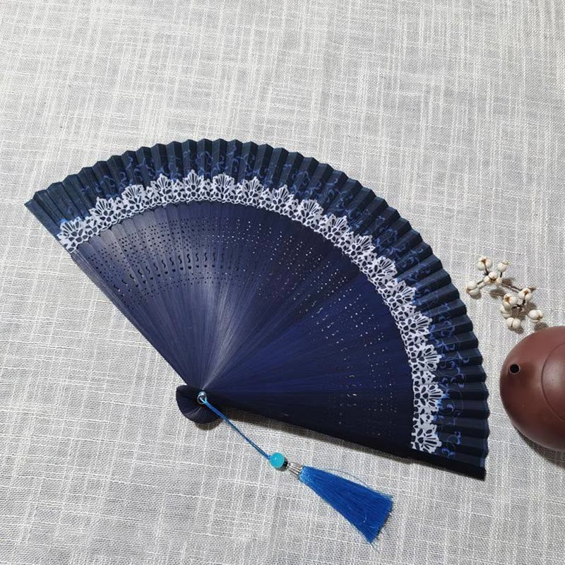 22cm Bamboo Folding Fan with Hollow Engraved Design | Tranquil Comfort