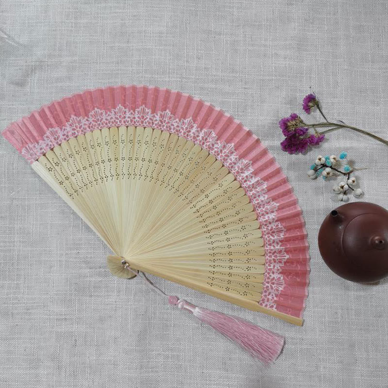 22cm Bamboo Folding Fan with Hollow Engraved Design | Tranquil Comfort