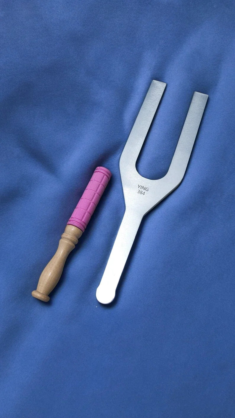 Metal tuning fork with pink-handled mallet in 256Hz and 384Hz Healing Therapy Set