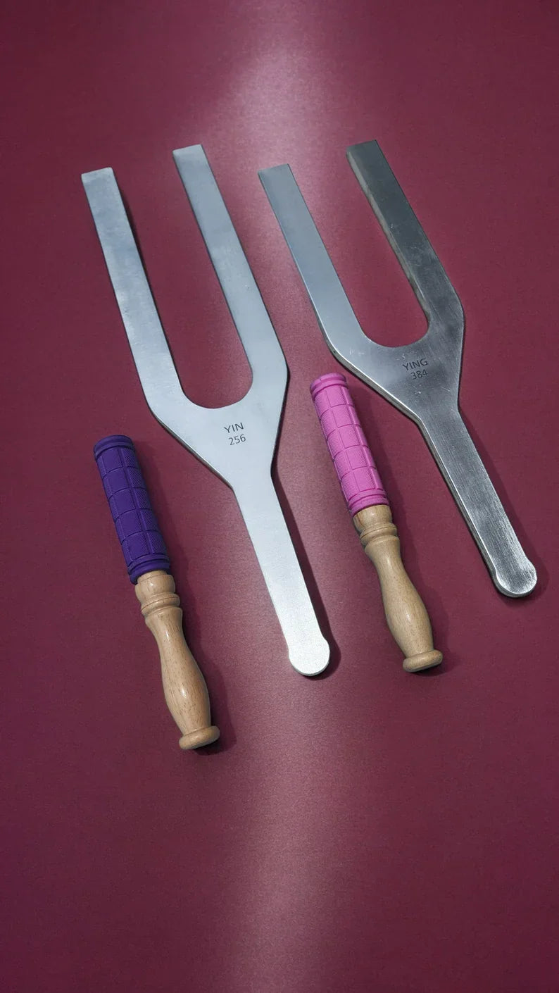 Three tuning forks with wooden handles from the 256Hz & 384Hz Tuning Fork Set