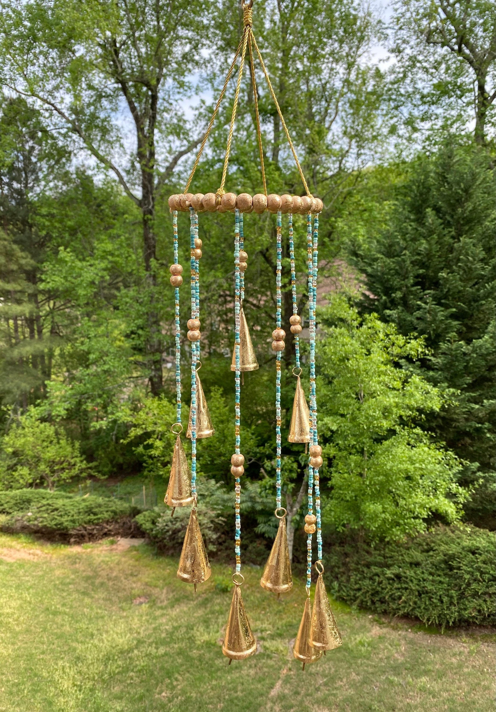 Handcrafted macramé wind chime with beads and tassels in Gold and Teal colors