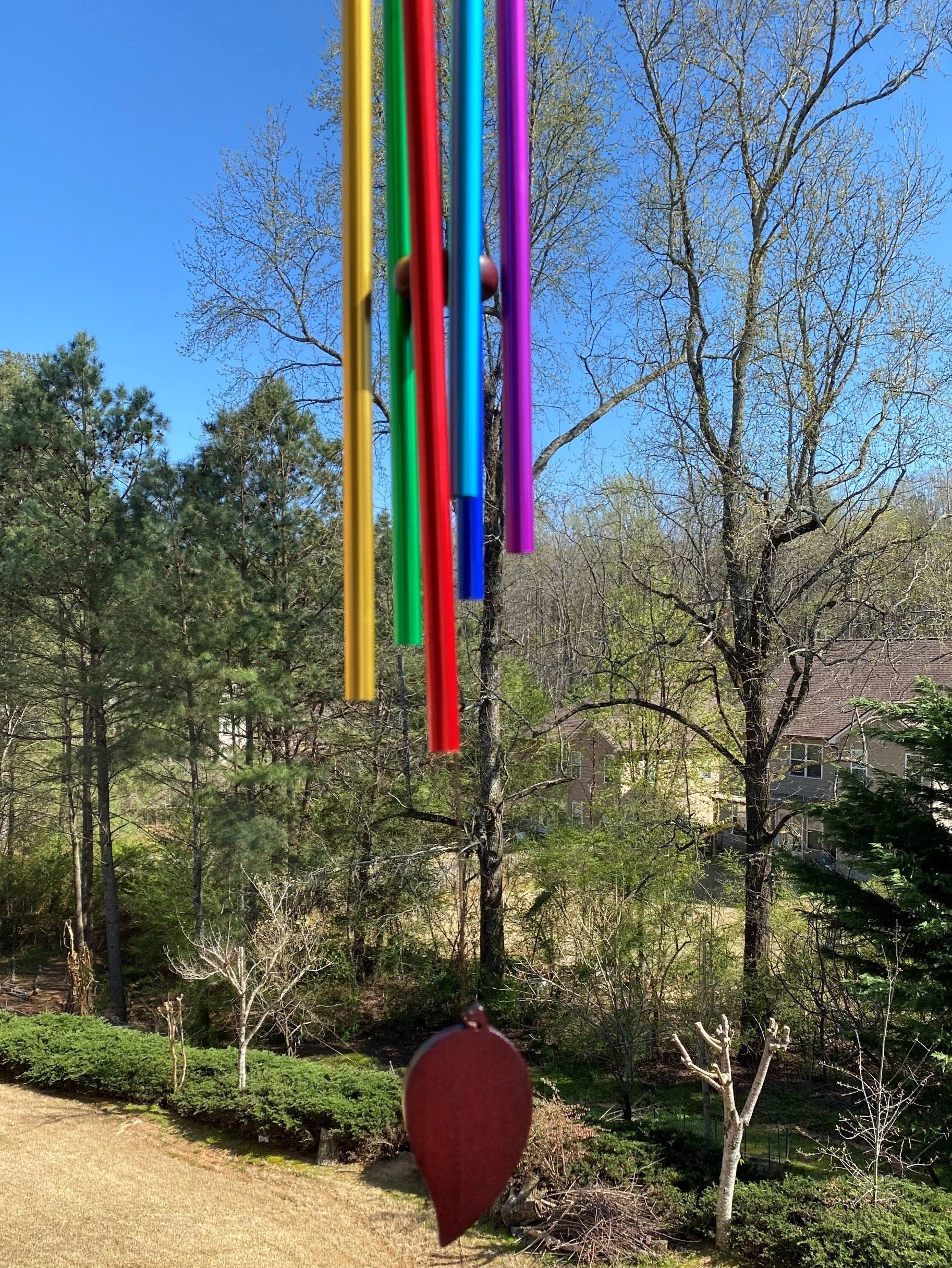 Colorful 28’’ Handmade Rainbow Metal Wind Chimes hanging for peaceful ambiance