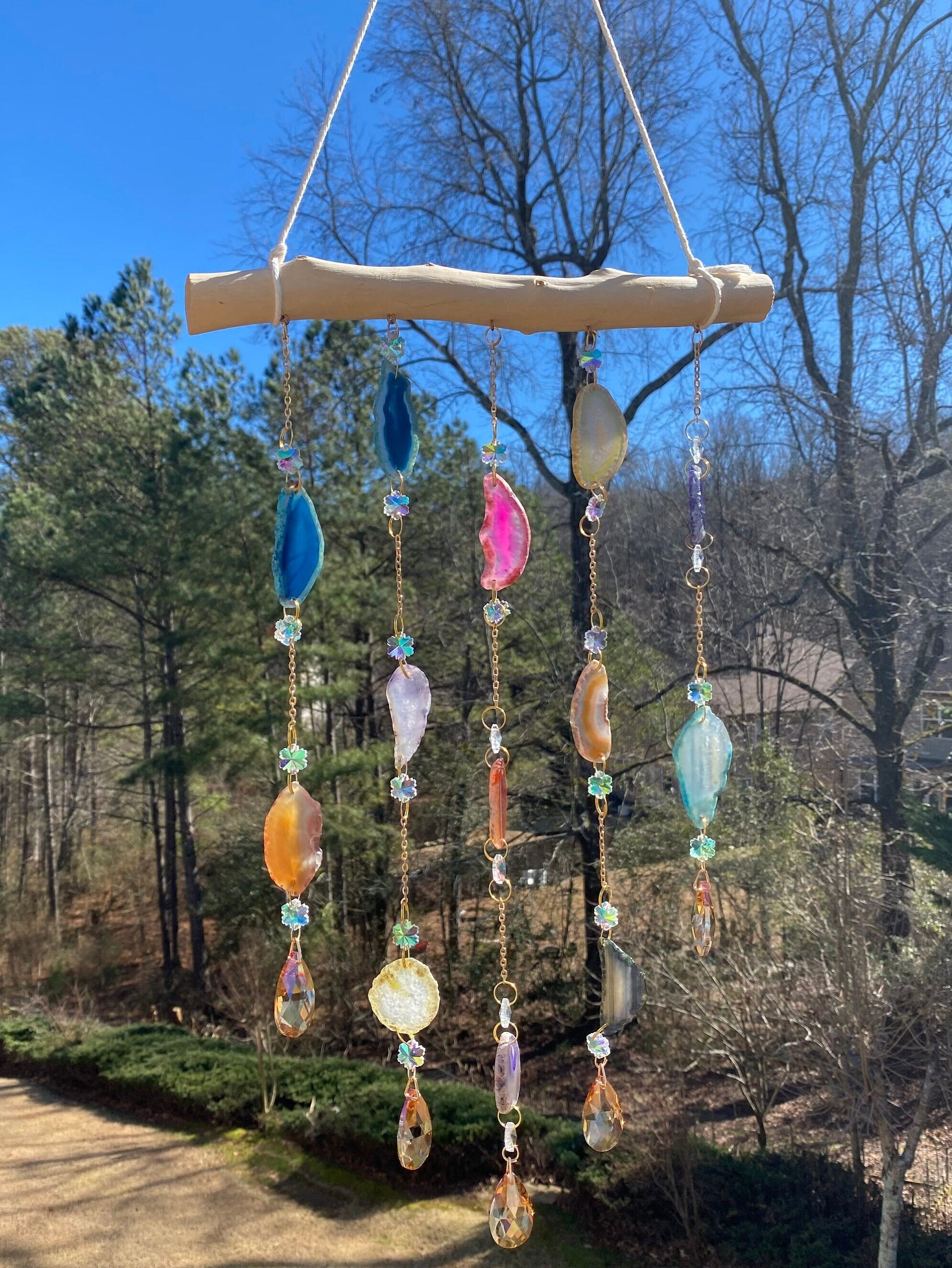 Colorful stone and bead wind chime hanging from wooden crossbar, 29’’ Crystal Wind Chimes