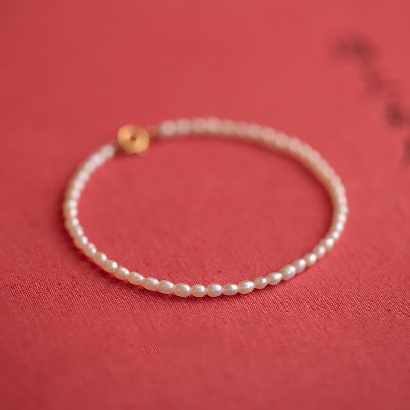 2mm Natural Pearl & 14k Gold Plated Wisdom Bracelet
