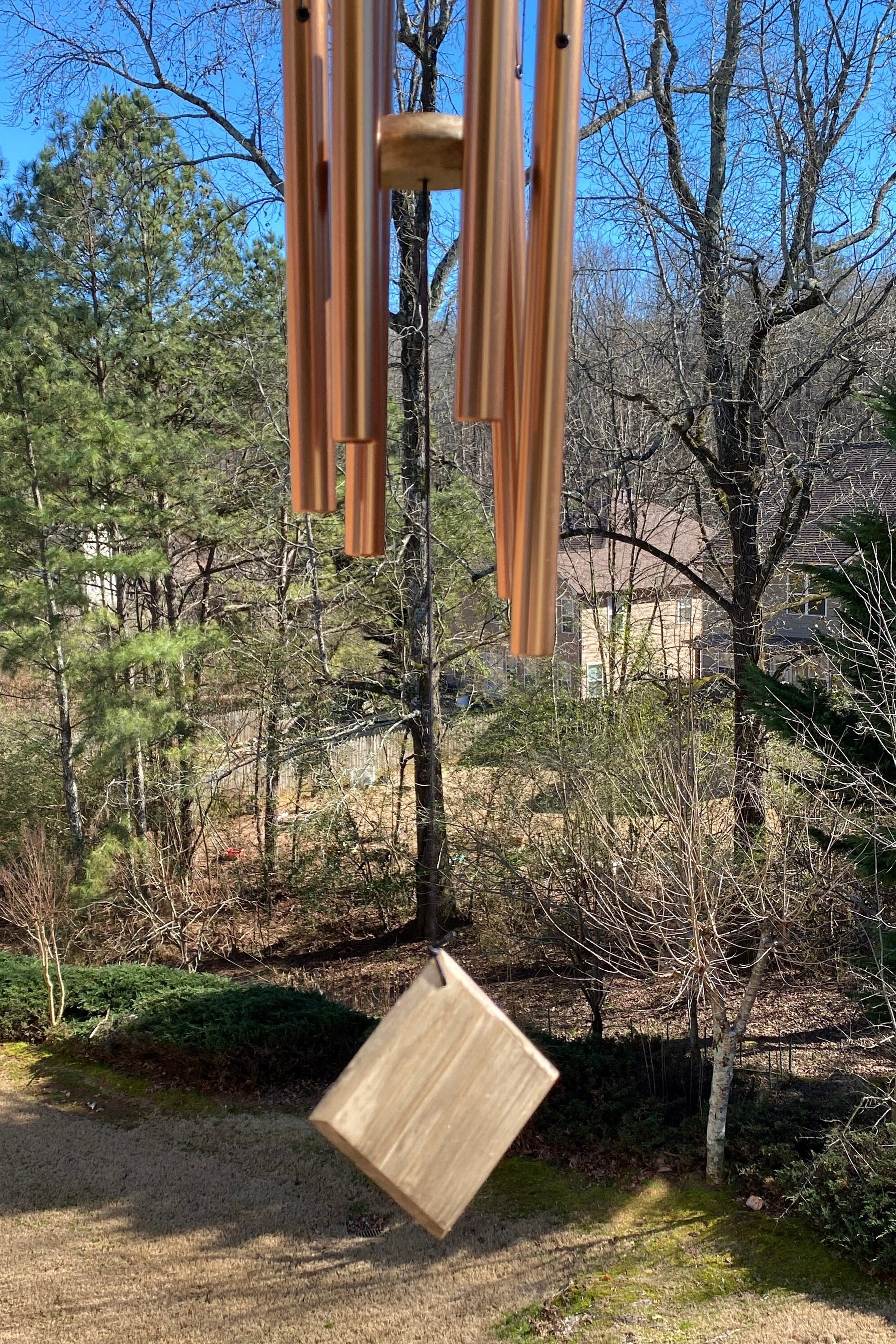 Wooden wind chime with diamond panels and bamboo tubes for a deep tone sound