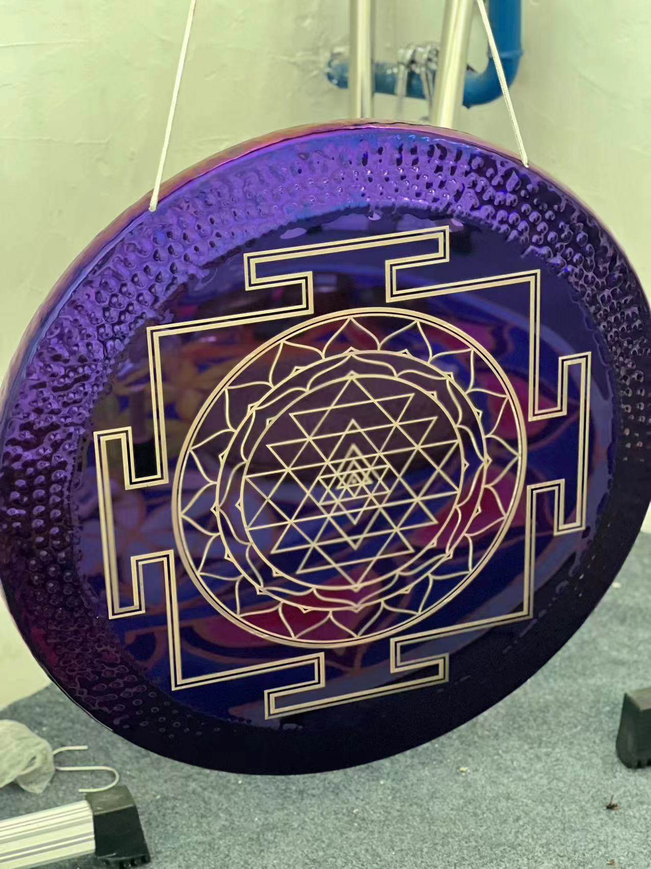 Purple circular disc with Sri Yantra pattern on 32’’ Sacred Geometry Gong for Sound Healing