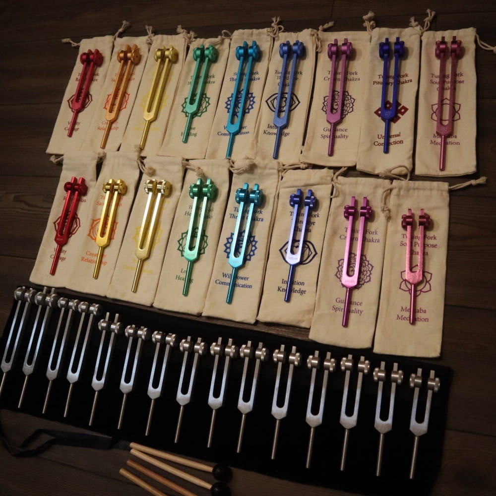 Colorful tuning forks on display board from 34pc Solfeggio & Chakra Tuning Fork Set