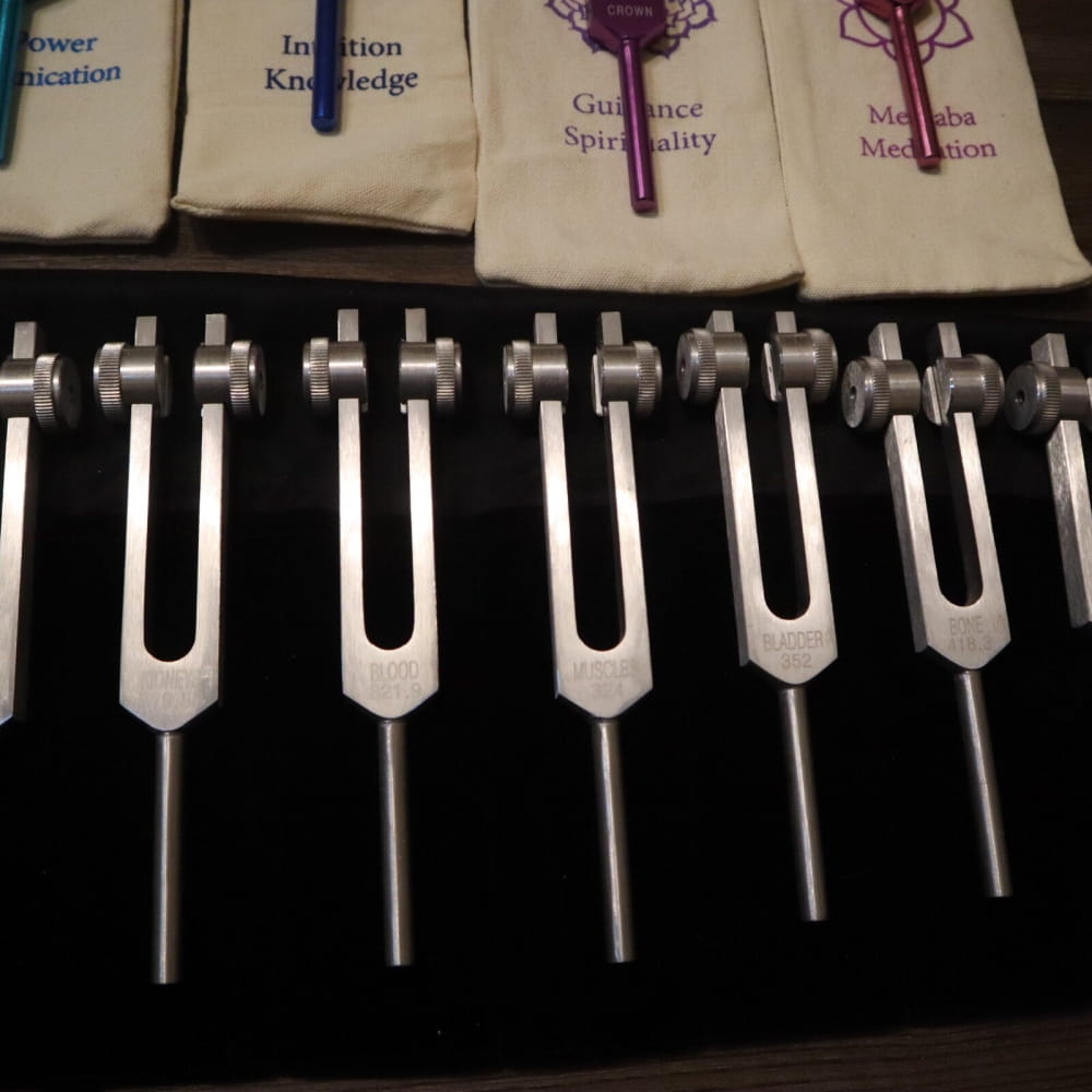 Tuning forks with labeled fabric cases in 34pc Solfeggio & Chakra Tuning Fork Set