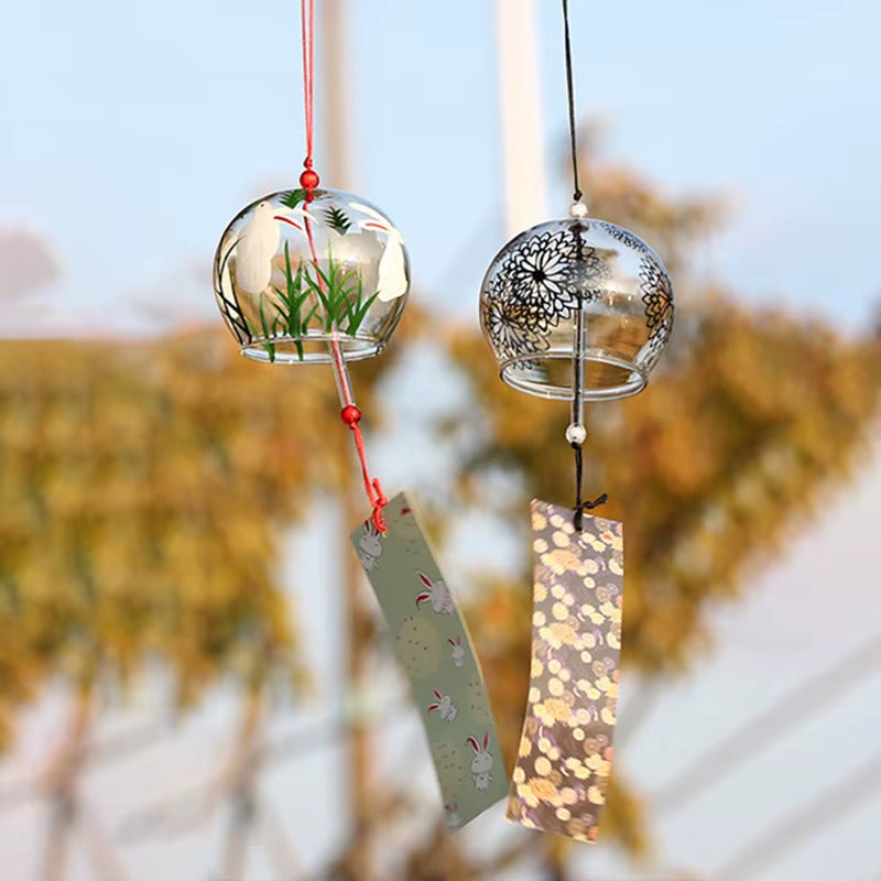 Japanese Glass Wind Chimes featuring decorative bells and hanging paper strips for outdoor decor