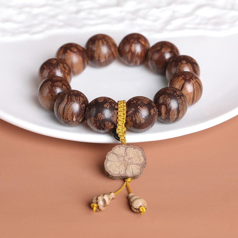 15mm Plum Blossom Wood Inner Peace Bracelet