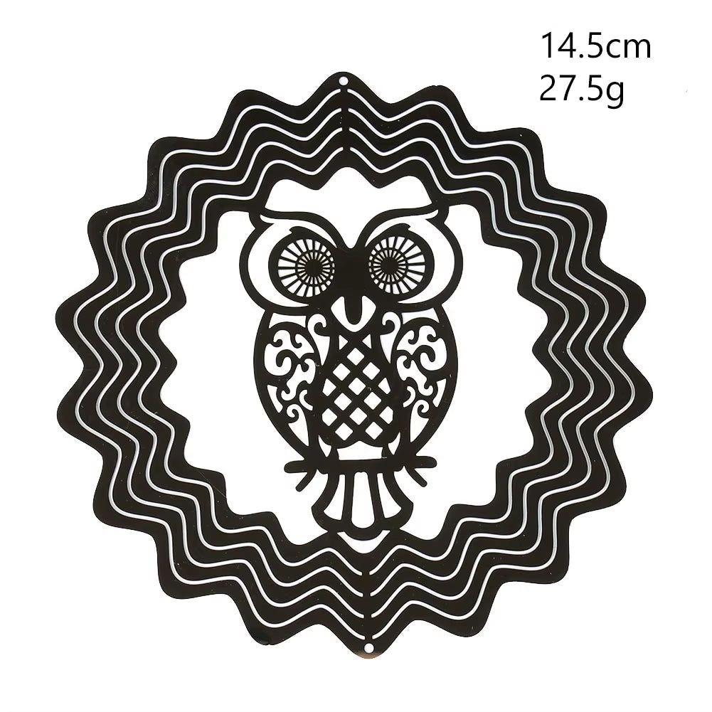 Decorative black owl design with spiral eyes in wavy circular border for wind spinner