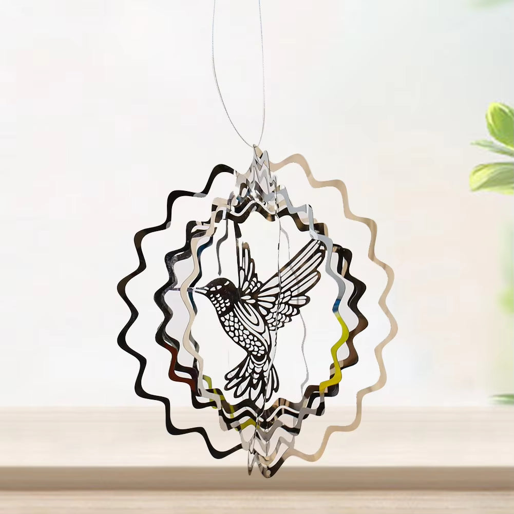 Metal wind spinner ornament with hummingbird in wavy circles for outdoor decor