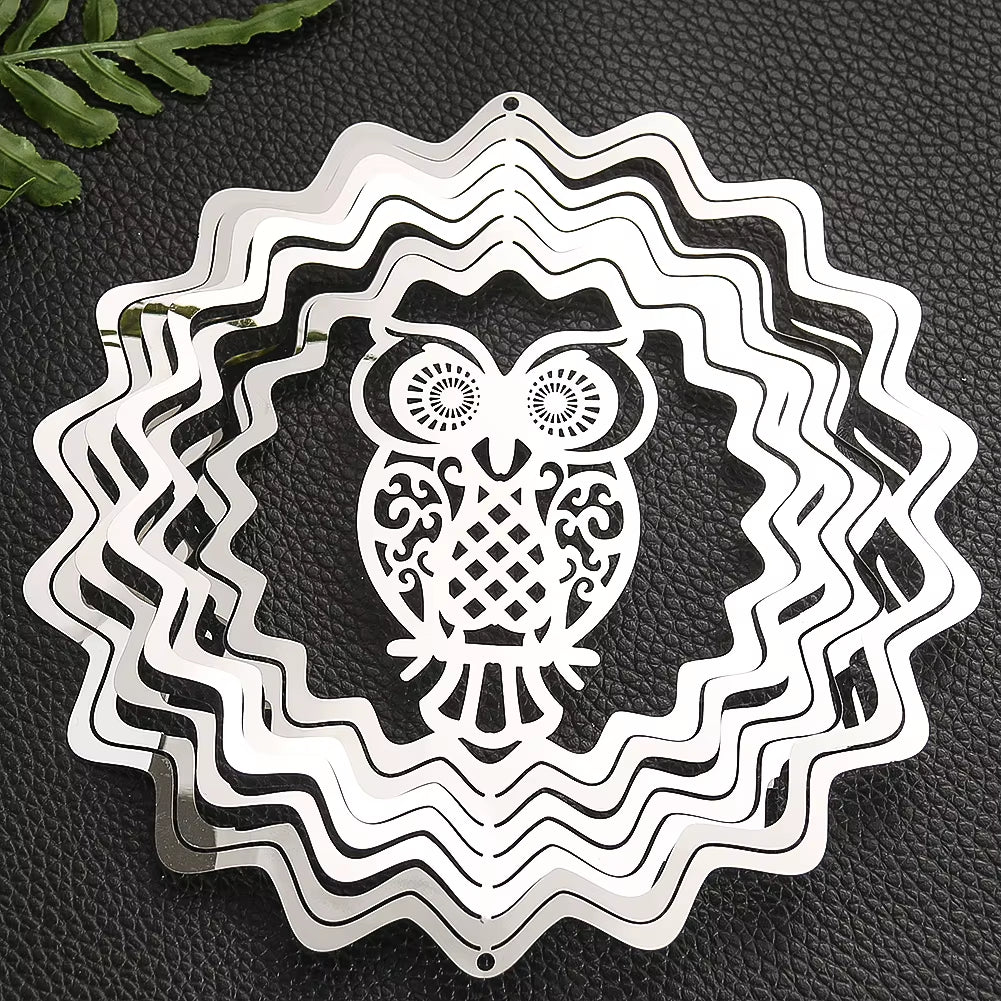 Metal wind spinner with owl design in zigzag pattern for outdoor decor