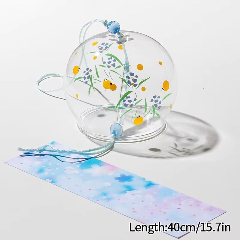 Glass cloche with floral designs featured in Japanese Glass Wind Chimes outdoor decor