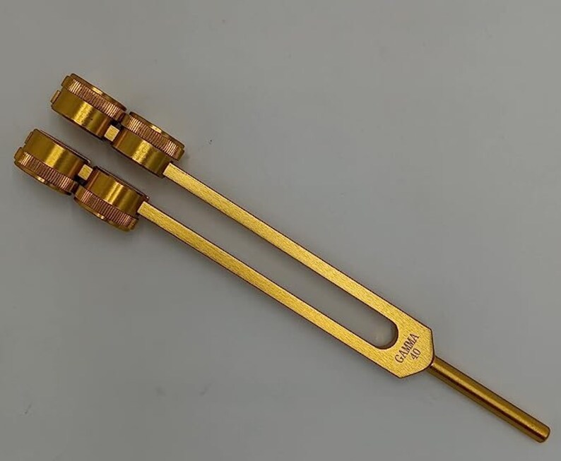 Golden tuning fork with adjustable weights for healing in mallet and bag set