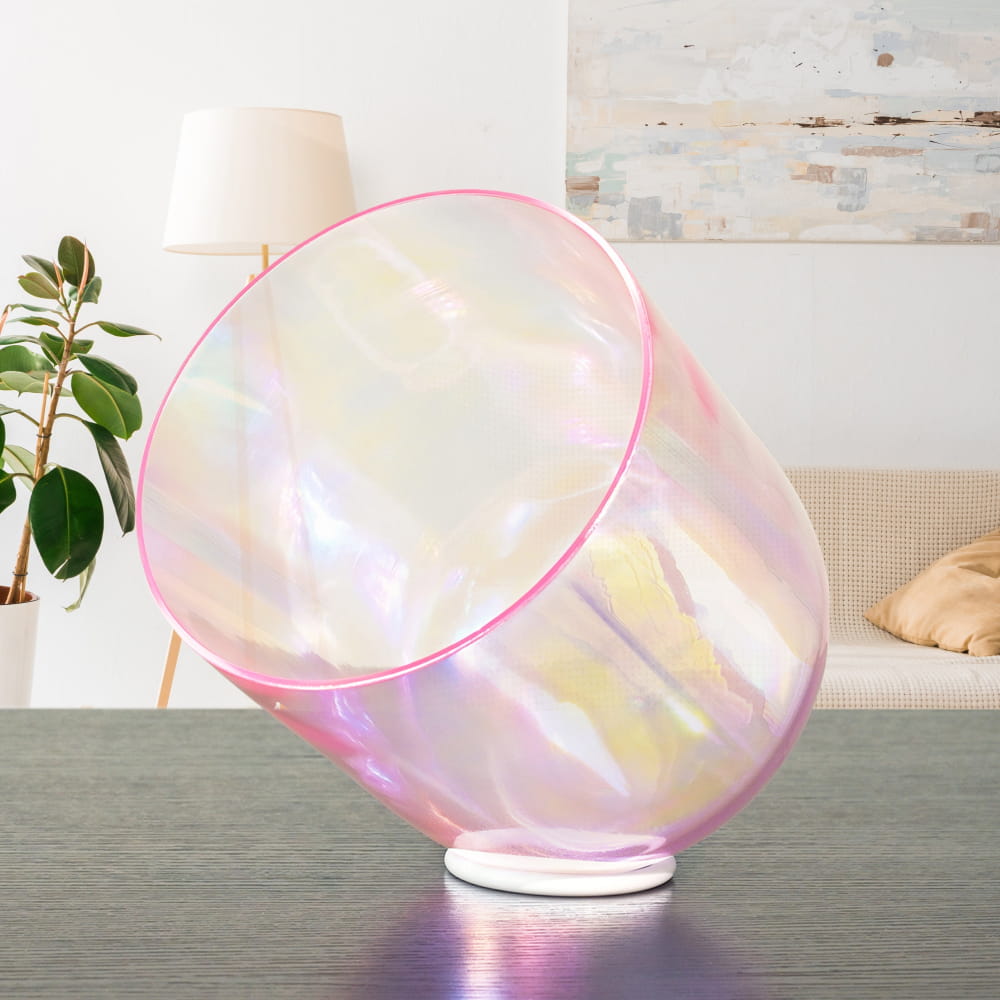 Iridescent cylindrical lamp with pink rim angled beside 432Hz Alchemy Cosmic Light