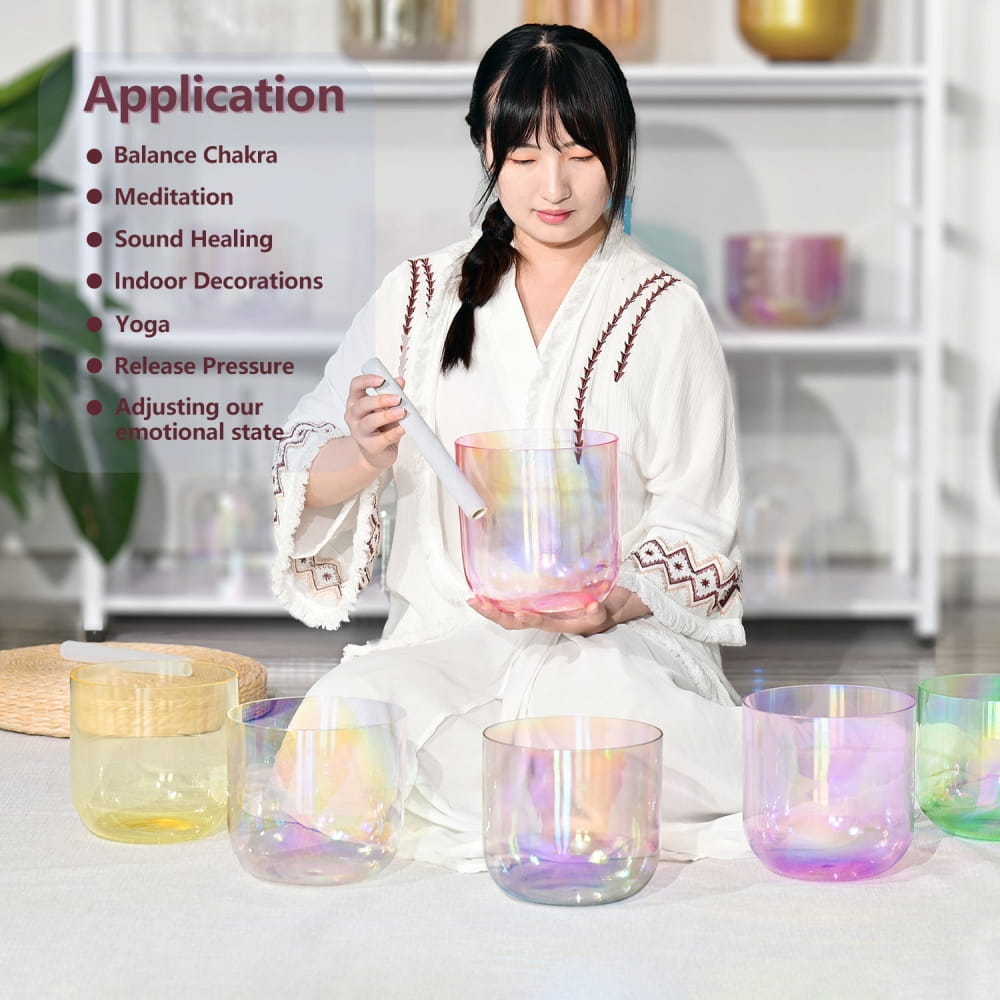 Iridescent crystal singing bowls on white surface featuring 432Hz Alchemy Clear Pink Bowl