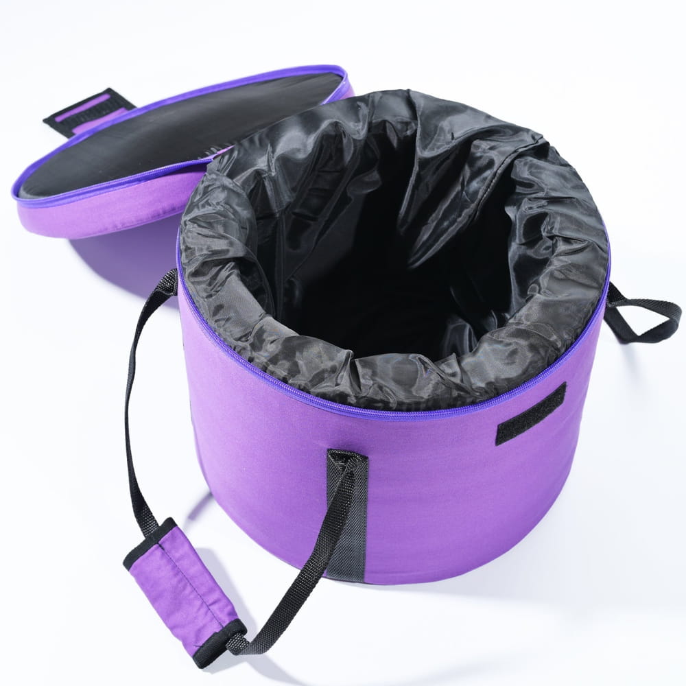 Purple collapsible travel pet bowl with black lining and carrying strap for convenience