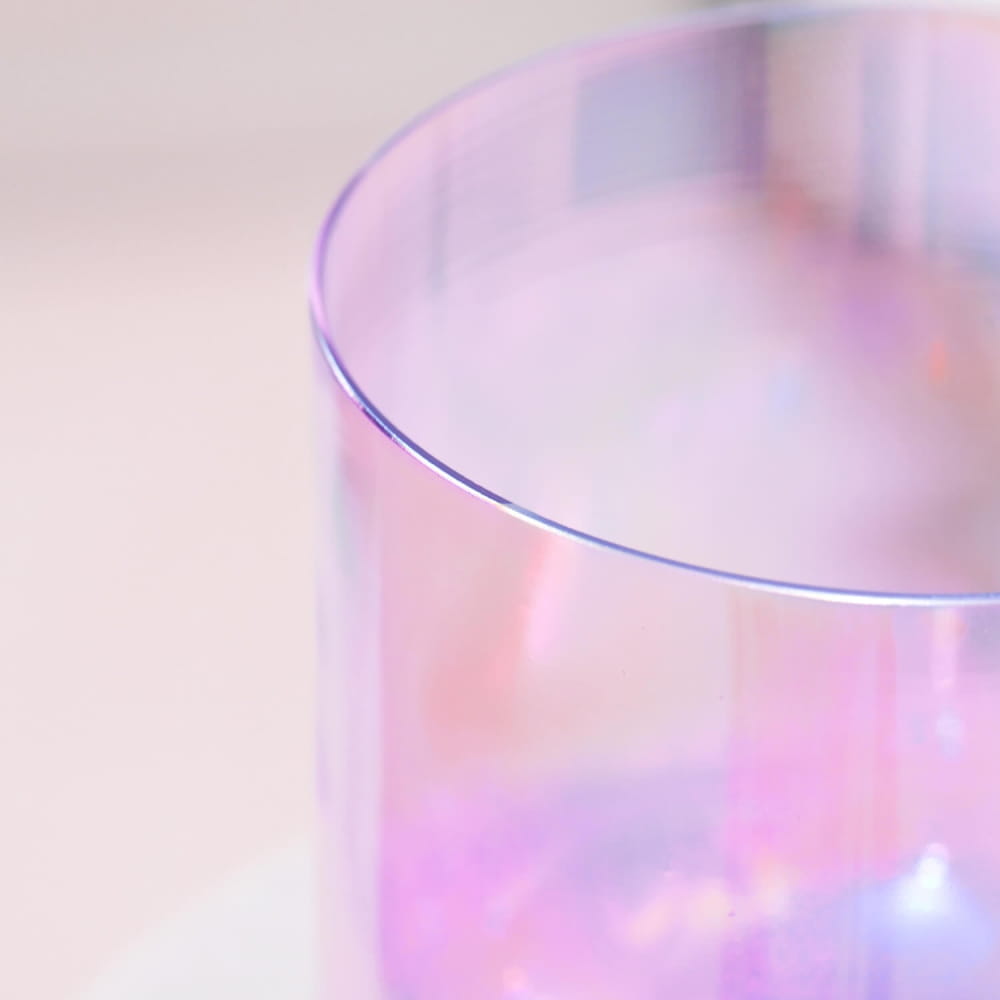 Glass with soft pink iridescent glow in 432Hz Alchemy Cosmic Light Crystal Singing Bowl