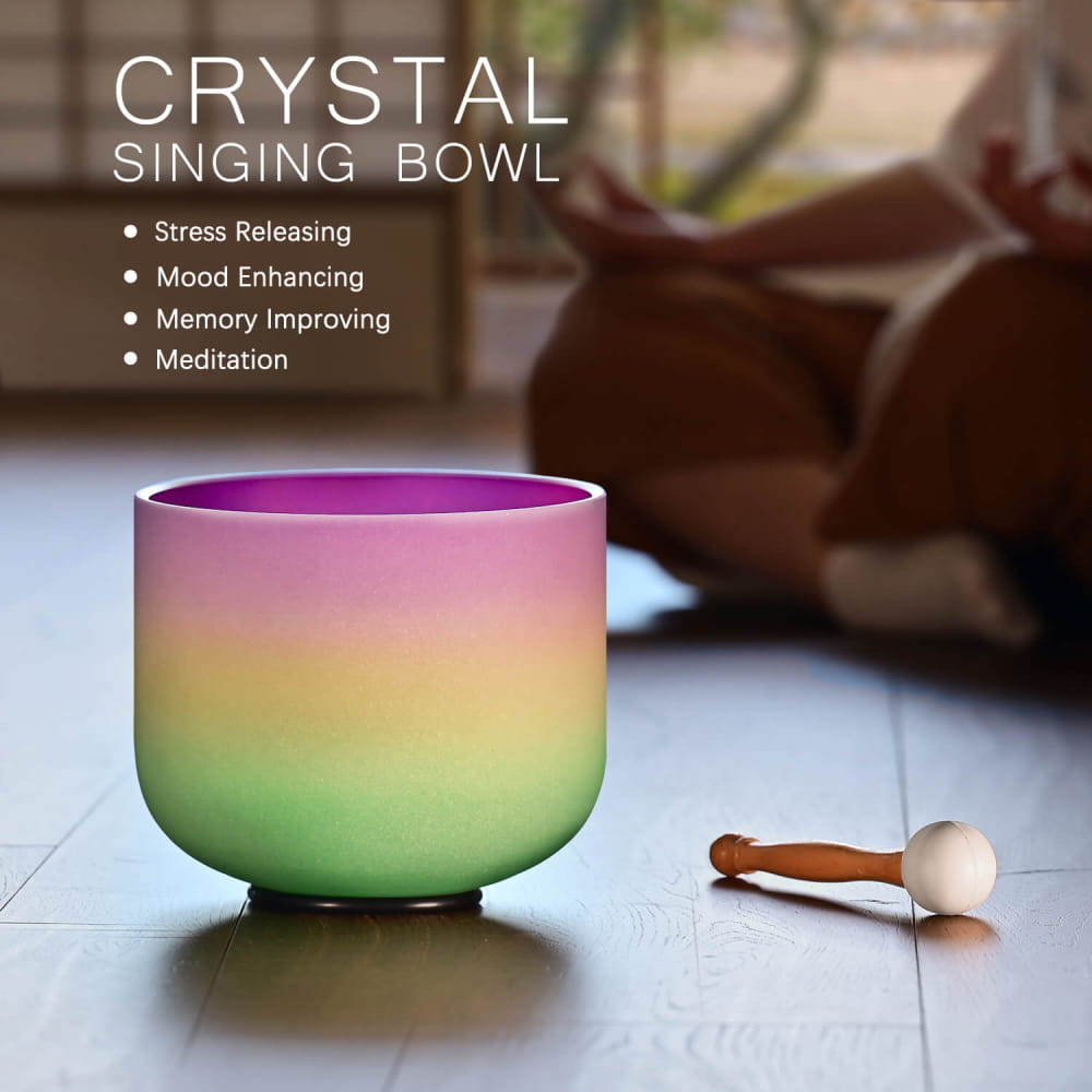 Rainbow-colored 440Hz 8 inch G Note Crystal Singing Bowl with wooden mallet beside it