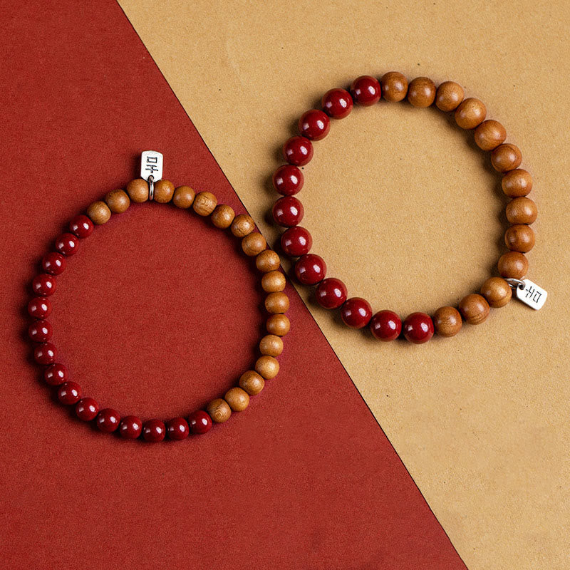 6mm Cinnabar Bracelet with Peach Wood & Sterling Silver Protection