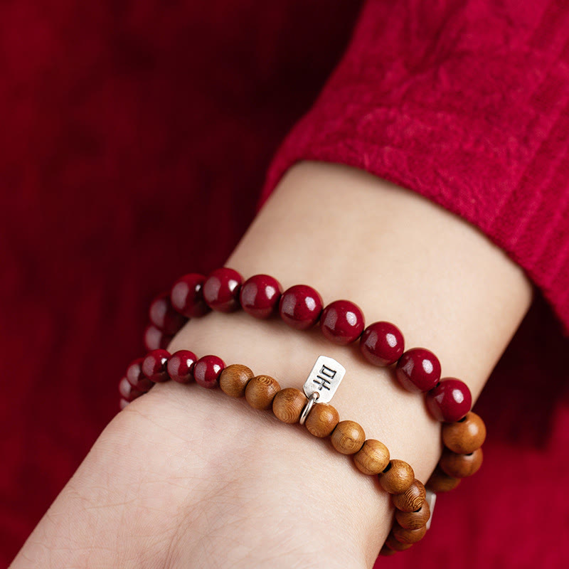 6mm Cinnabar Bracelet with Peach Wood & Sterling Silver Protection