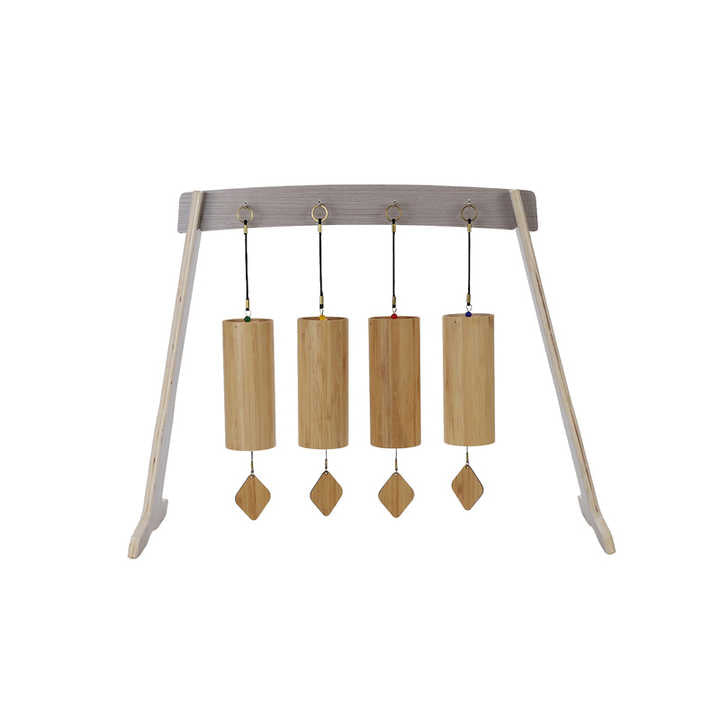 Four wooden chimes on a metal stand in 4pc Wind Chime Set with protective case