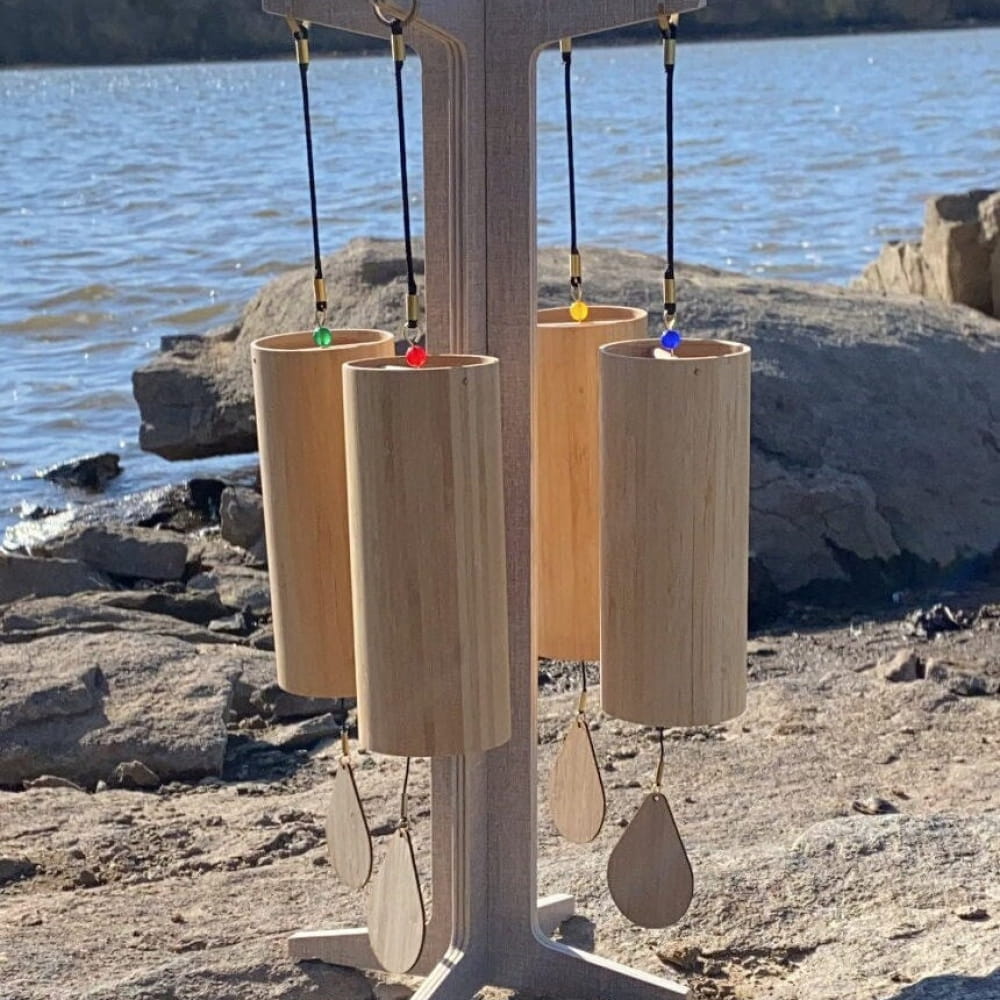 Wind chimes with tan cylindrical tubes in a 4pc set with protective case and sound vibration