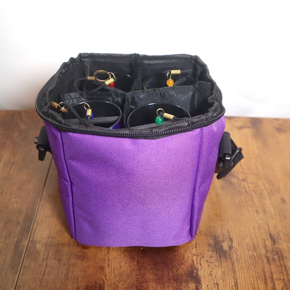 Purple fabric wine carrier with compartments and black trim for wine storage