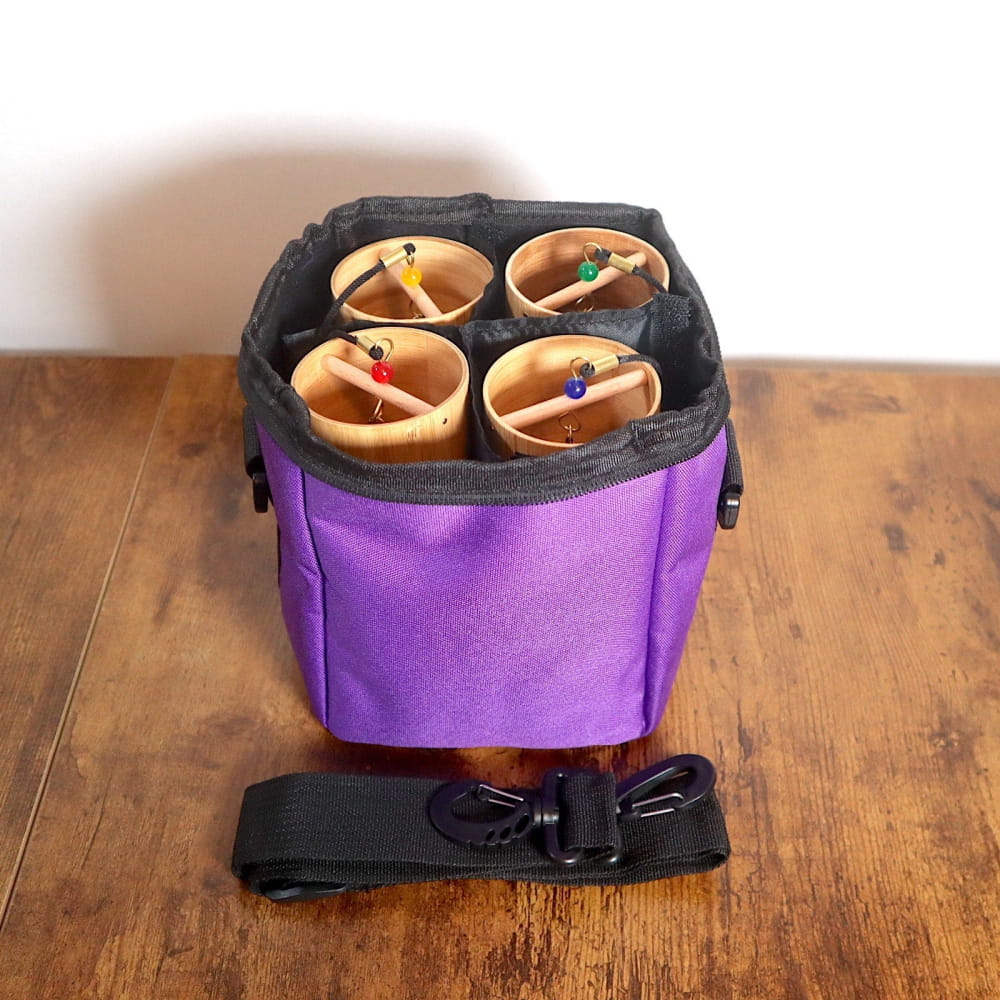 Purple insulated carrier bag with four cylindrical compartments for Wind Chime Set