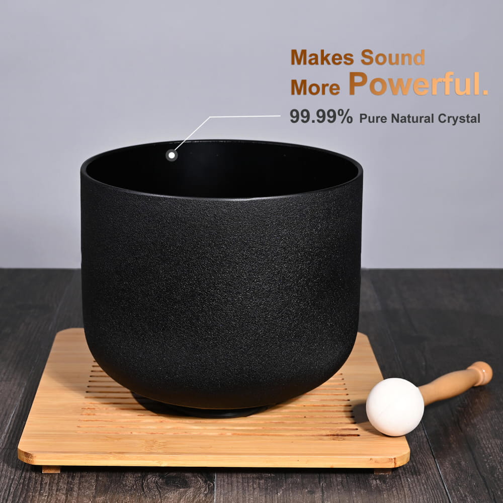 Black crystal singing bowl with wooden mallet on bamboo base, 528Hz C Note