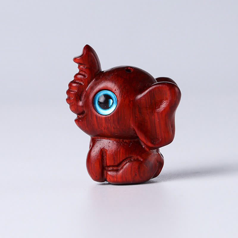 Mini Elephant Carved Decoration in Sandalwood for Protection & Luck