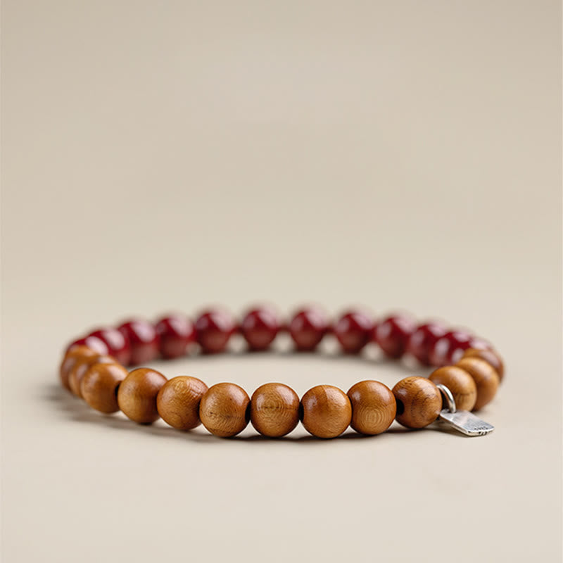 6mm Cinnabar Bracelet with Peach Wood & Sterling Silver Protection