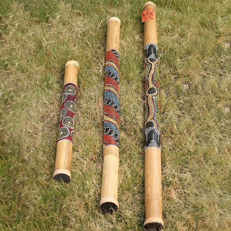 Three beautifully painted Didgeridoos with Aboriginal dot art and patterns