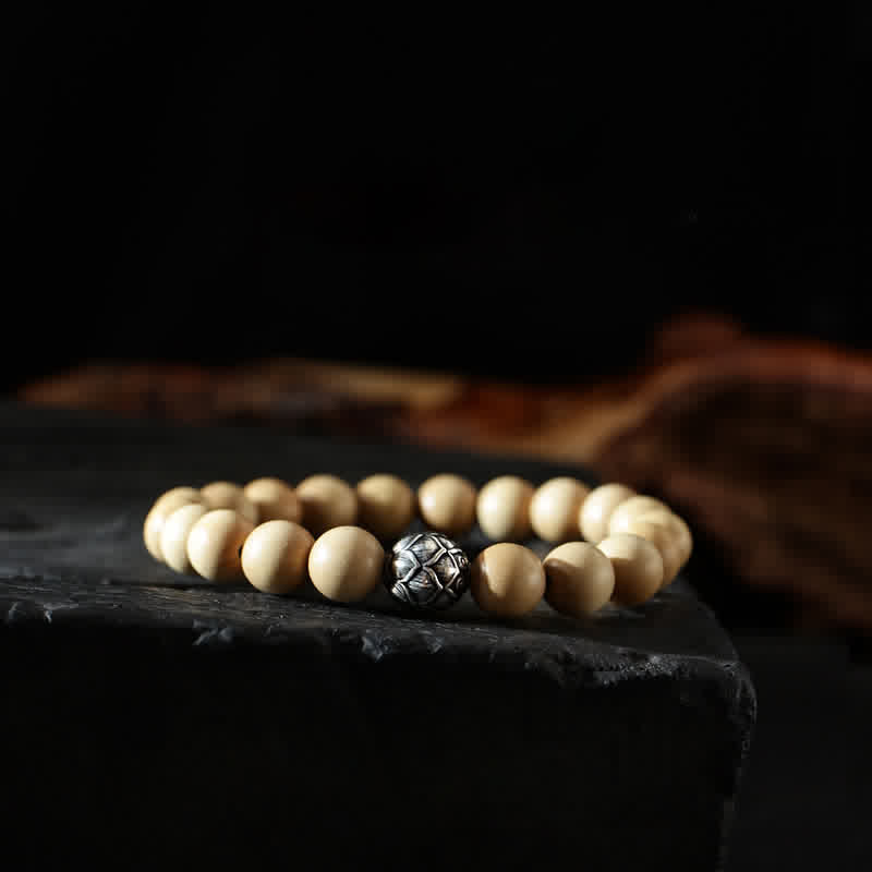 Cinnabar Bracelet with Peach Wood and Lotus Symbols