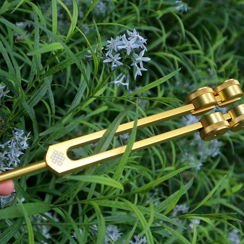 Golden tuning fork with adjustable resonator for 68.05 Hz Biofield Healing Therapy