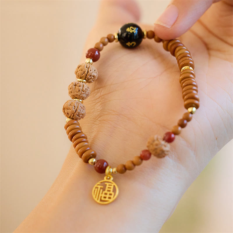 Om Mani Padme Hum Bracelet Bodhi Seed and Black Onyx