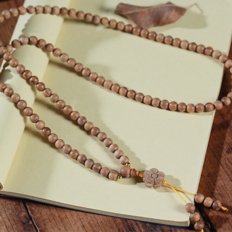 6mm Sandalwood Plum Blossom Charm Mala Bracelet for Calmness & Healing