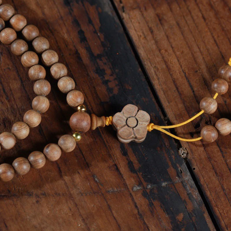 6mm Sandalwood Plum Blossom Charm Mala Bracelet for Calmness & Healing