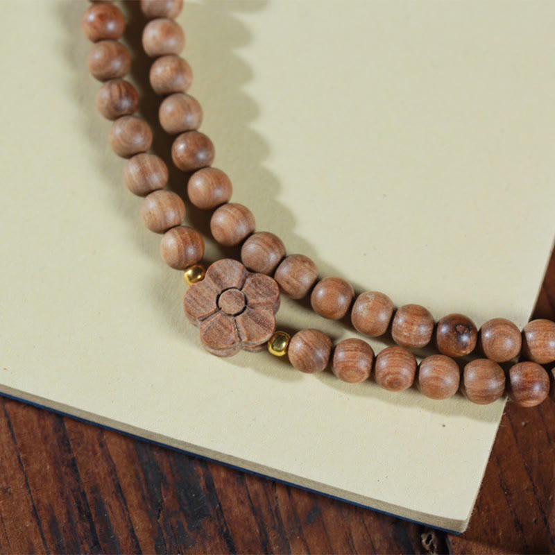 6mm Sandalwood Plum Blossom Charm Mala Bracelet for Calmness & Healing