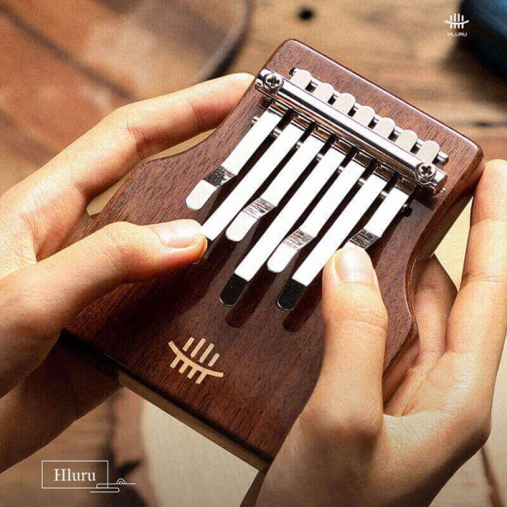7-Key C Tone Thumb Piano with Resonance Hole - Portable Finger Piano - Kalimba - On sale